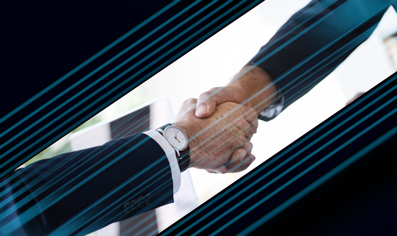 Handshake, hands, agreement — Essential Construction Project Management Tools Every Builder Should Use