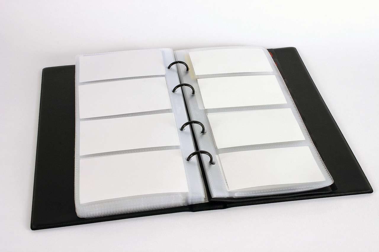 Business card holder, business cards, workbook — UNT Health Fort Worth Shares New Naming Direction